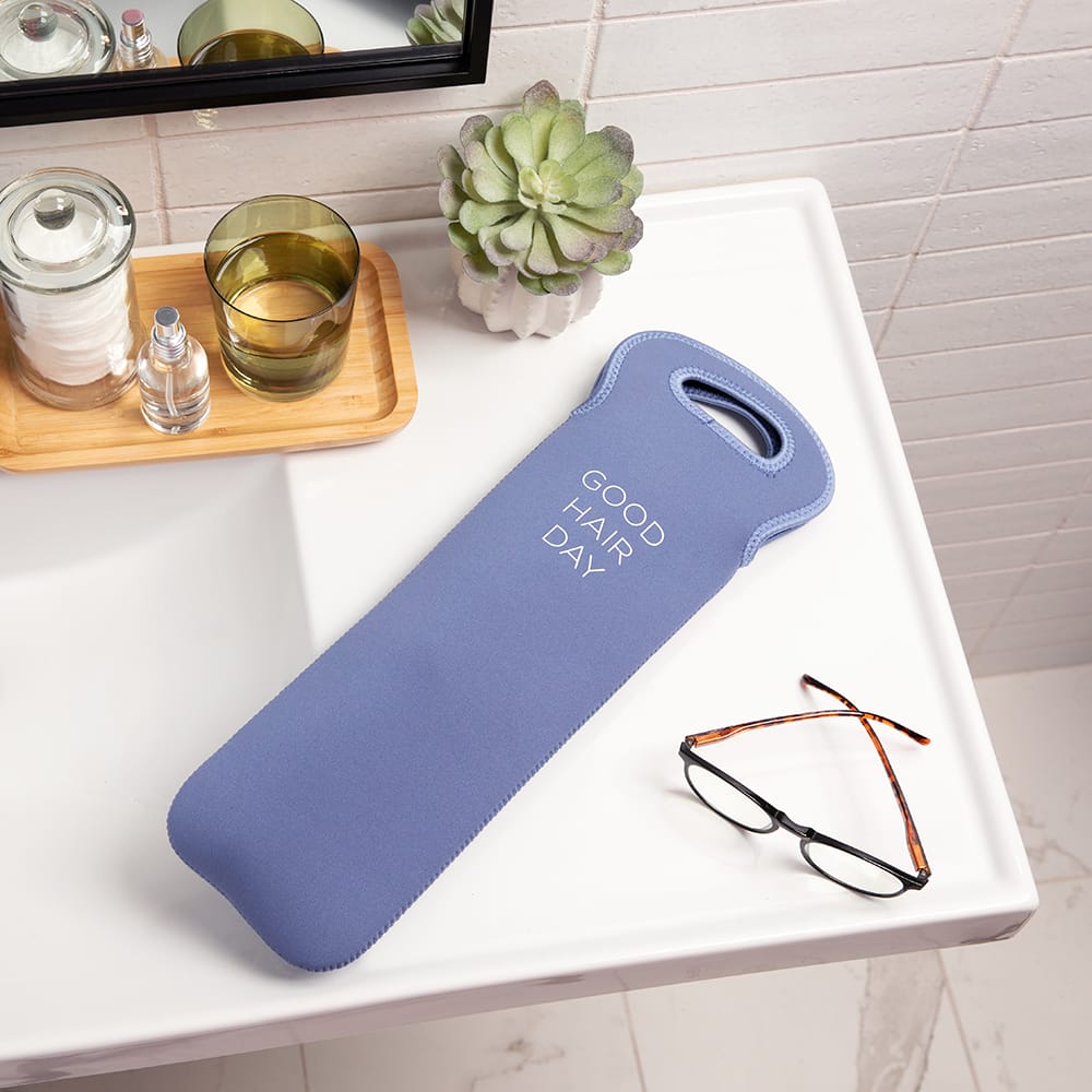 Slate Blue XL Hair Iron Case sitting on bathroom counter.