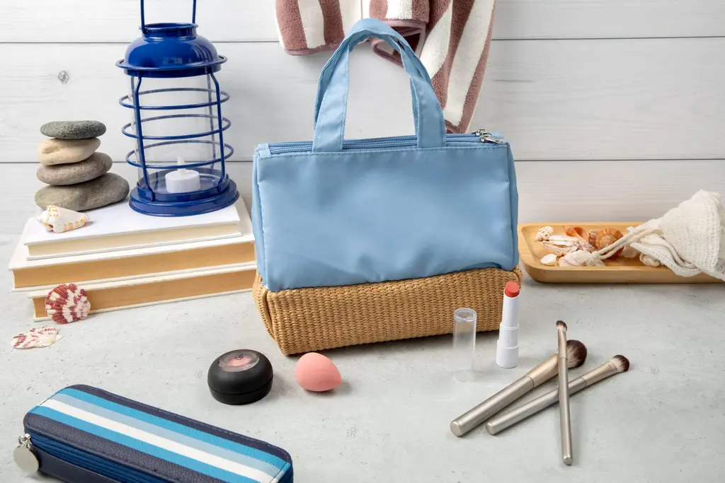 Image of Miamica's Coastal Charm collection Travel Cosmetic Bag and XL Rectangular Pill Case.